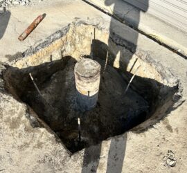 Abandoned oil well casing exposed during excavation for a Soil Methane Testing investigation evaluating potential methane migration pathways.