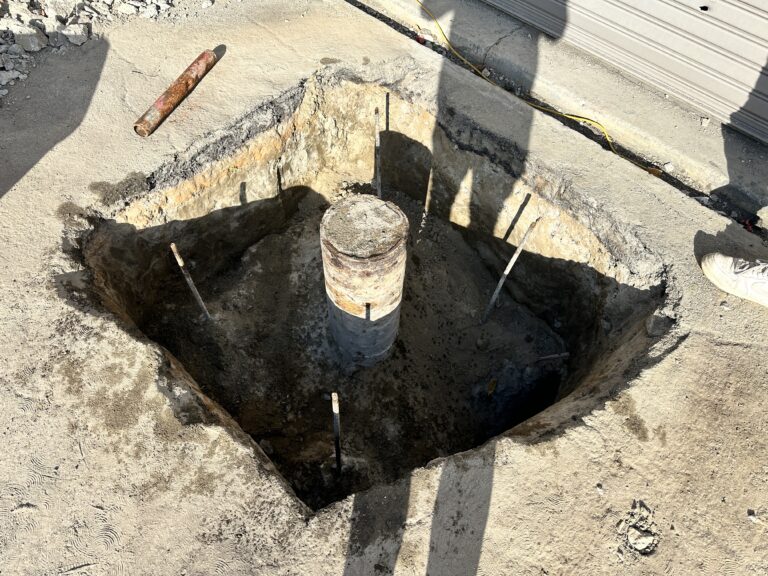 Abandoned oil well casing exposed during excavation for a Soil Methane Testing investigation evaluating potential methane migration pathways.