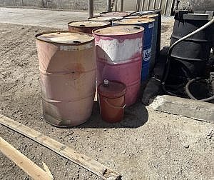 Leaking Oil Drums with No Secondary Containment - REC in Phase I Environmental Study